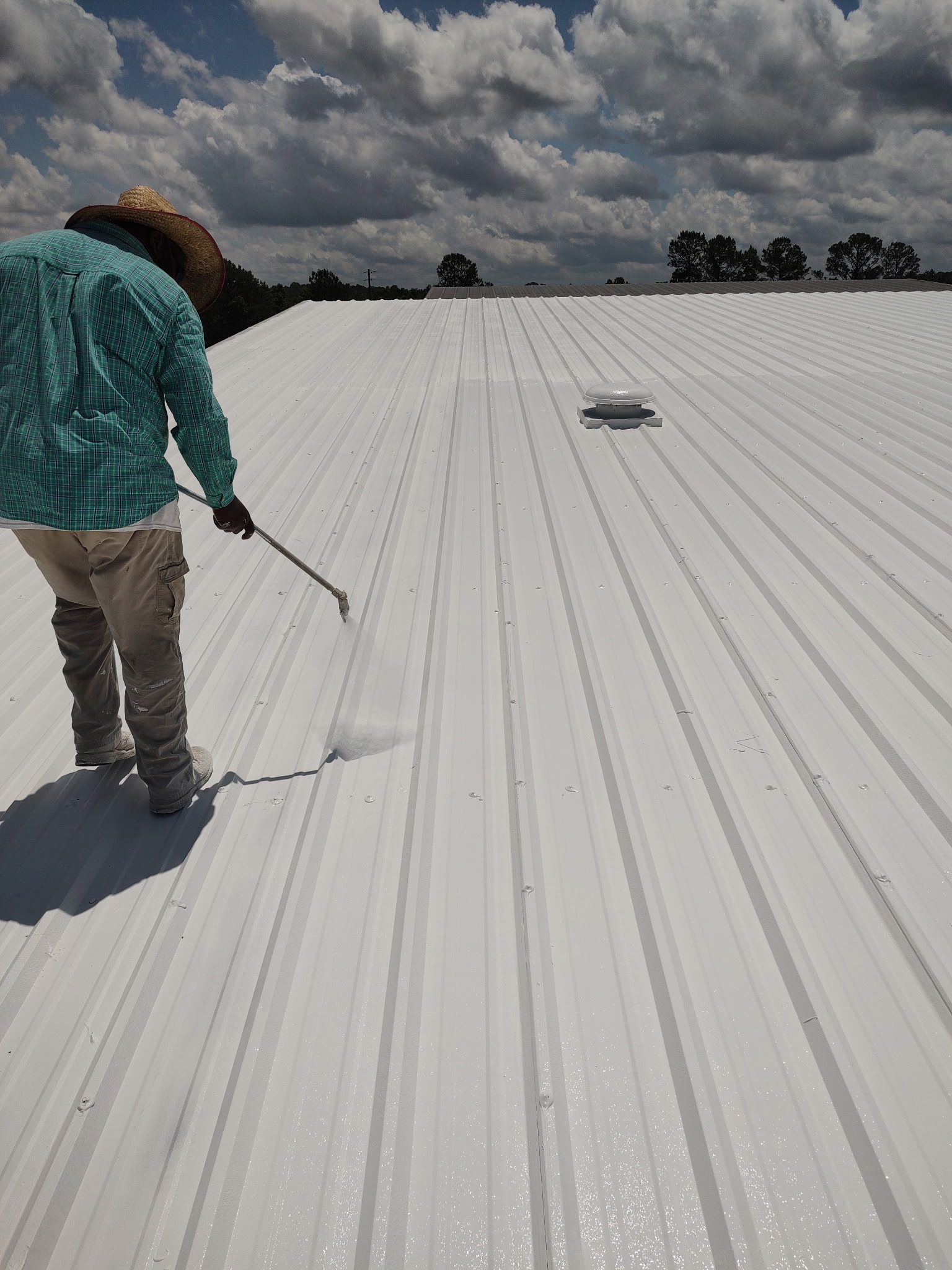 Metal roof coating application