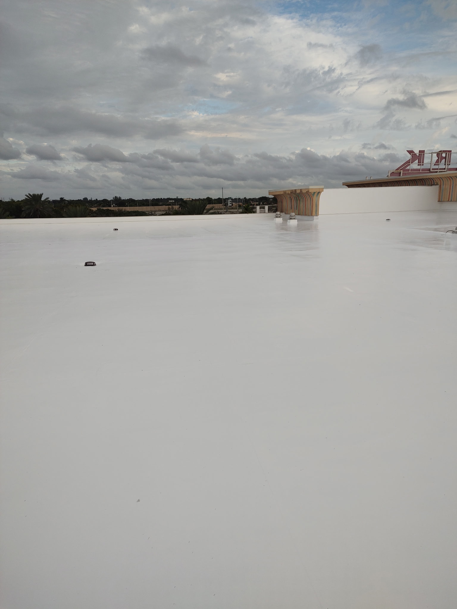 Large commercial white TPO roof